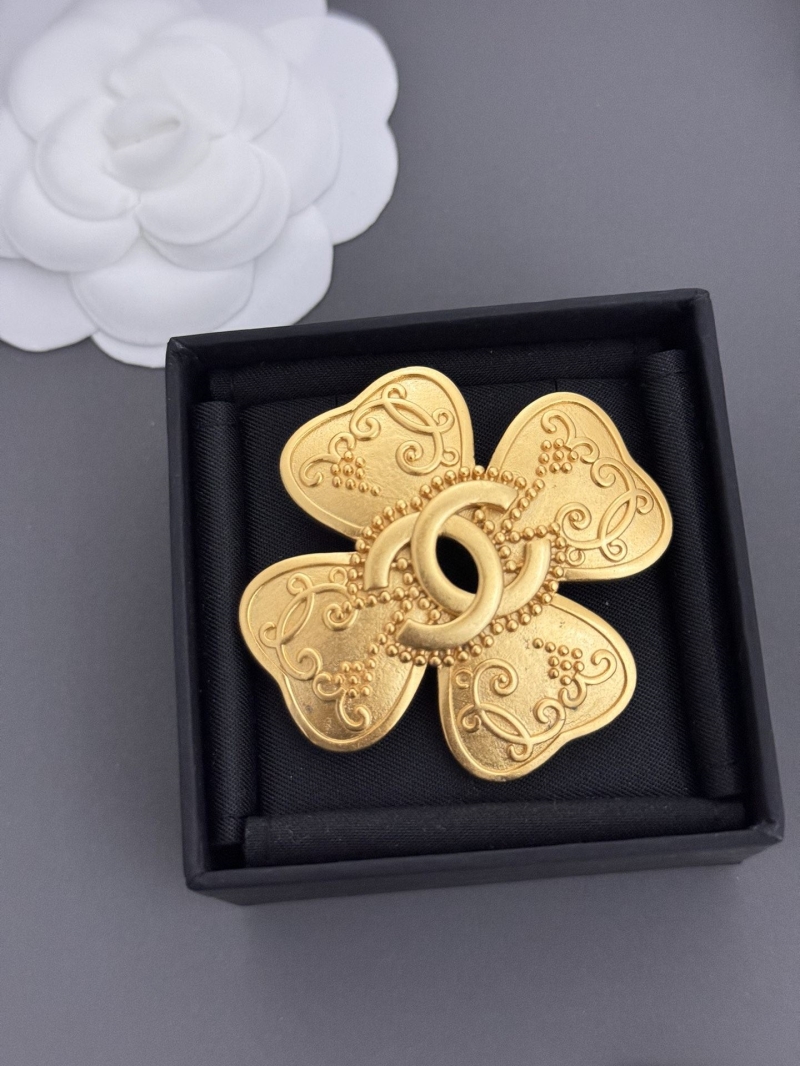Ch**el brooches